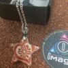 Ciondolo piccolo a forma di Stella con collanina color argento